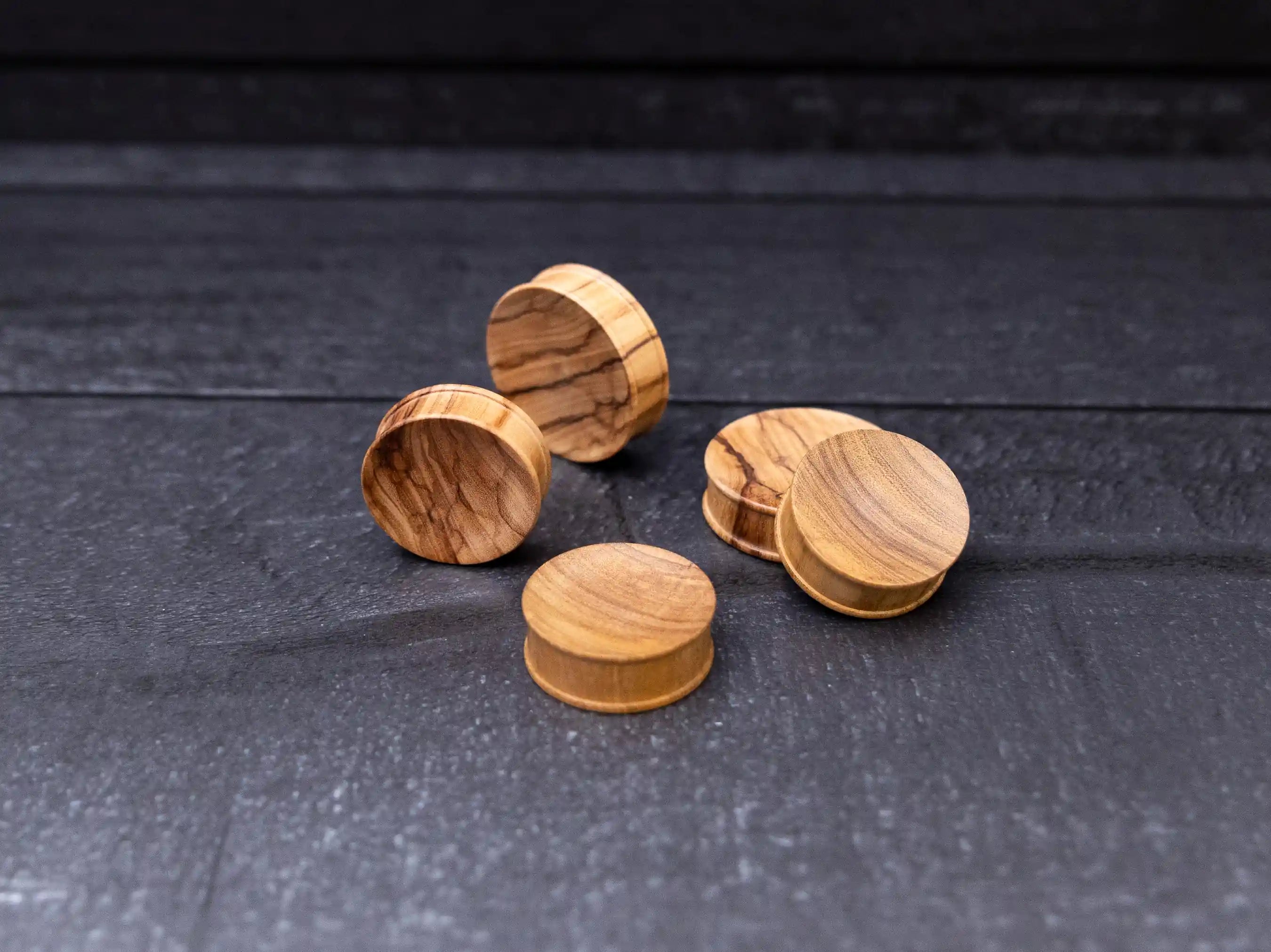 Olive wood concave plugs