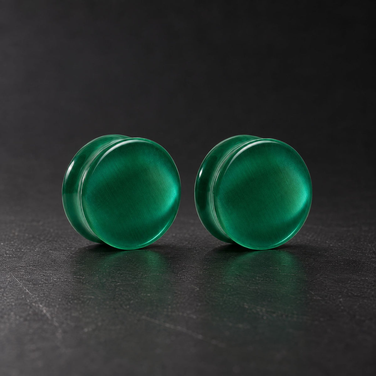 Green Cats Eye Plugs, pair on black