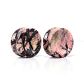 Pink / Black Rhodonite Concave Plugs, pair on white